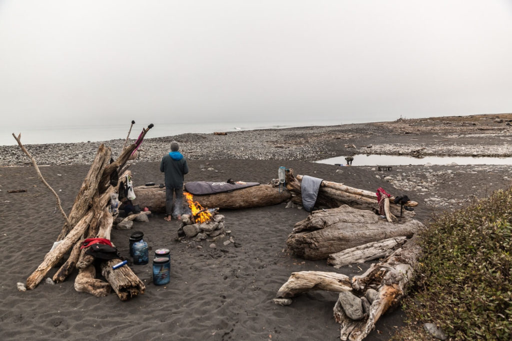 People Around Campfire on Beach