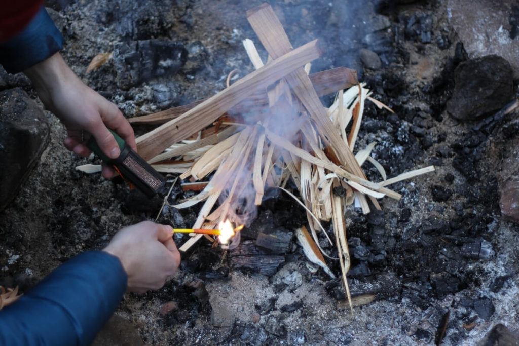 Lighting Campfire with Match