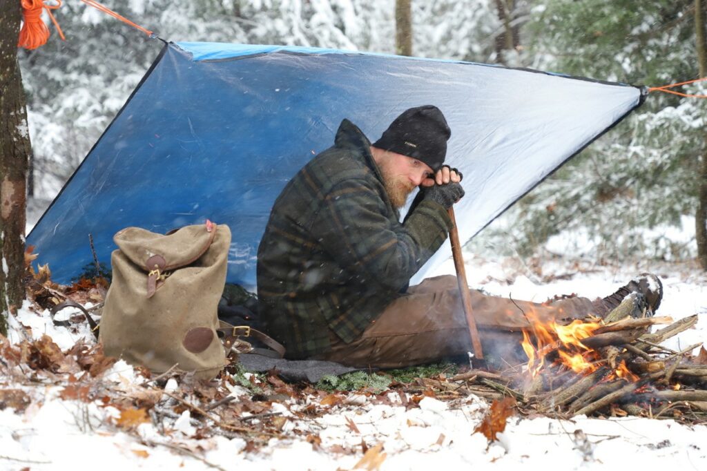 Tarp shelter with fire sale